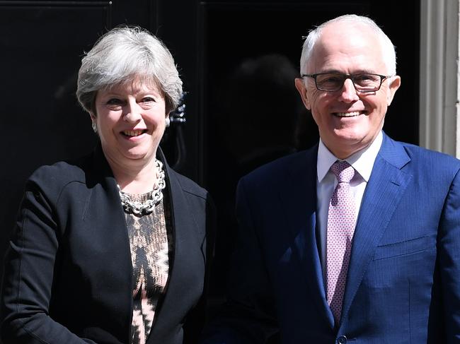 Australian Prime Minister Malcolm Turnbull (right) is greeted by British Prime Minister Theresa May outside 10 Downing Street in London, Monday, July 10, 2017. Prime Minister Malcolm Turnbull is in the United Kingdom for a three-day official visit. (AAP Image/Lukas Coch) NO ARCHIVING