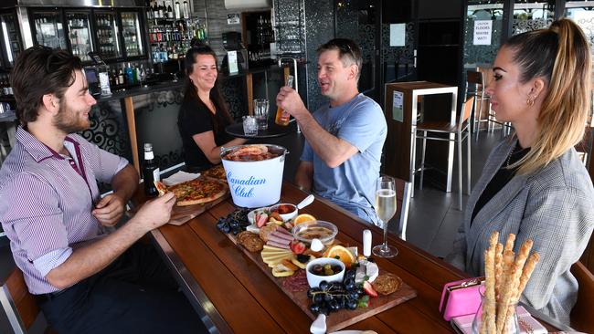 Alan Haber, Manager Tania Mackie, David Egan and Megan Gray at MOJO Rooftop Bar at the Ambassador Hotel. Picture: Tony Martin