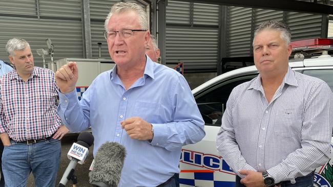 Mundingburra MP Les Walker takes swipe at the LNP's opposition leader in earshot of the police minister Mark Ryan and Thuringowa MP Aaron Harper.