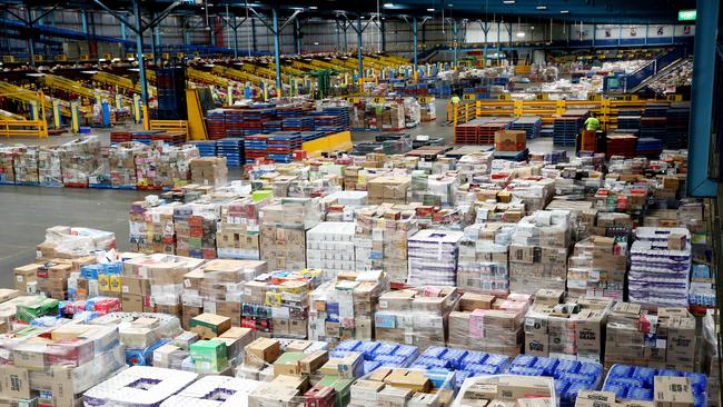 Forklifts move stock at Woolworths distribution centre at Minchinbury in Sydney’s west on Wednesday. Picture: Nikki Short