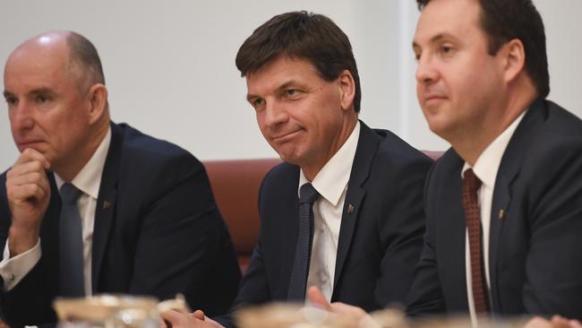 Energy Minister Angus Taylor (centre) has acknowledged “prices are no longer sustainable”.