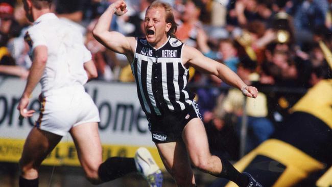 Adrian Settre celebrates one of his three first half goals in the 1990 premiership decider.