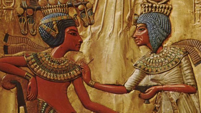 Tutankhamun and his wife Ankhesenamun depicted in a scene on the gilded throne found in the king's tomb.