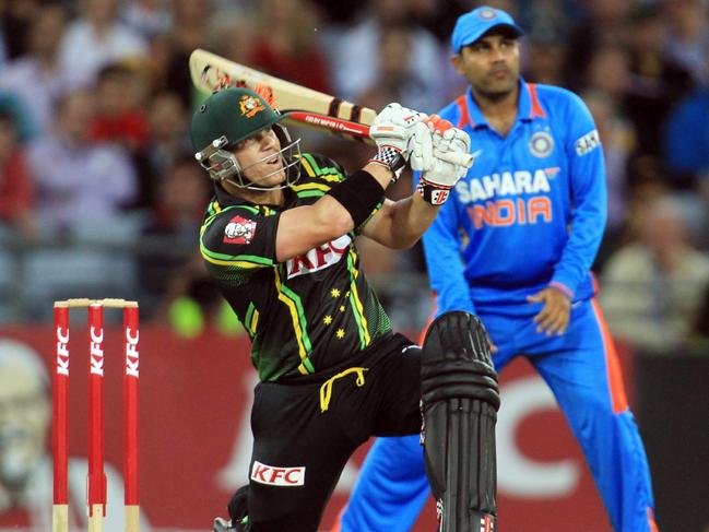 01/02/2012 SPORT: Left-handed batsman David Warner hits a six right-handed during Australia v India Twenty20 match at ANZ Stadium, Olympic Park, Homebush in Sydney.