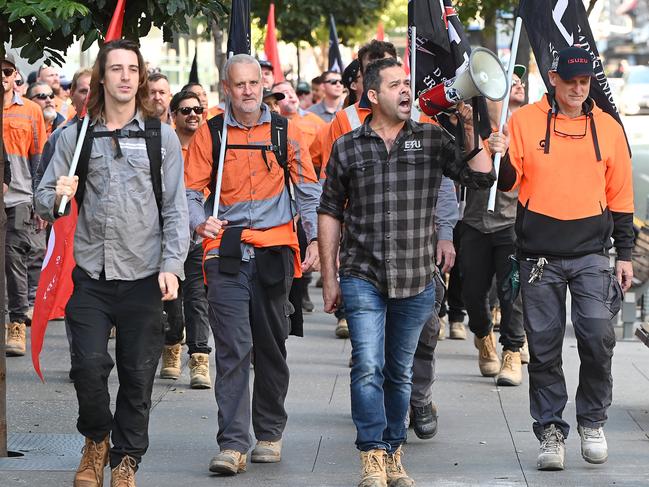 The Electrical trade Union marching through Brisbane CBD this morning. Picture John Gass