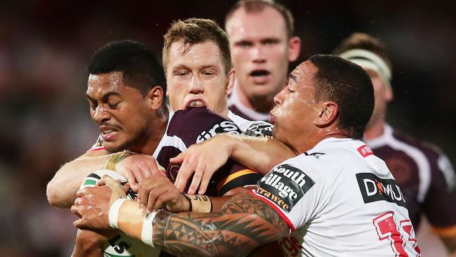 SYDNEY, AUSTRALIA - MARCH 08:  Anthony Milford of the Broncos is tackled during the round one NRL match between the St George Illawarra Dragons and the Brisbane Broncos at UOW Jubilee Oval on March 8, 2018 in Sydney, Australia.  (Photo by Matt King/Getty Images)