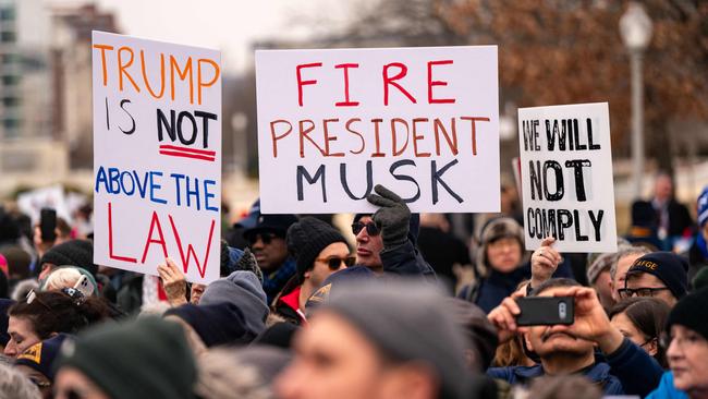 Unionised federal workers and members of congress denounced President Trump and his allies including Elon Musk, head of the so-called ‘Department of Government Efficiency’ (Doge) for purging government workers, all while branding government employees the "enemy of the people." Picture: Kent Nishimura/Getty Images/AFP