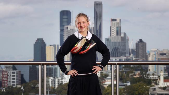 Star runner Isabella Harte in her St Margaret's Anglican Girls school uniform ahead of Thursday’s QGSSSA track and field championship. Picture: Liam Kidston