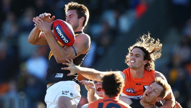 Tigers ruckman Shaun Hampson flies for a mark. Picture: Getty Images