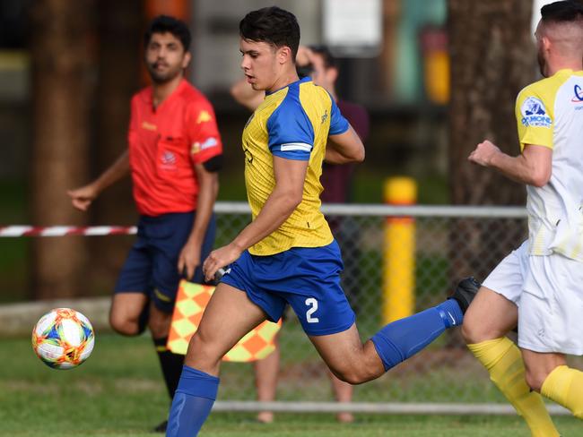 FFA Cup football Broadbeach United vs. North Star at Nikiforides Family Park, Broadbeach.  Broadbeach's Liam Collins and Star's Ryan Tanser. (Photo/Steve Holland)