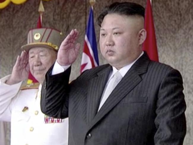 North Korea's leader Kim Jong-un salutes during a parade at Kim Il-sung Square in Pyongyang on Saturday. Picture: KRT via AP
