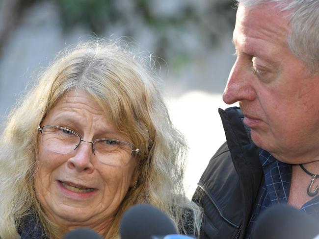 A tearful Faye Leveson is comforted by her husband Mark during a press conference today. Picture: Simon Bullard