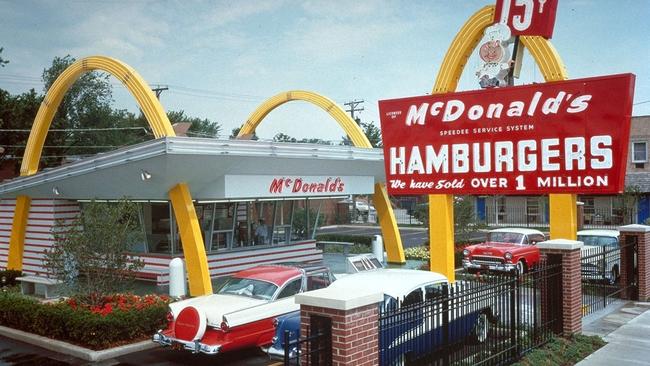 1950s pic shows the first McDonald's in Des Plaines, Illinois. Ray Kroc's first McDonalds restaurant opened here on 15 Apr 1955. AFP picMcDonald's/Corp cafes restaurants exterior advertising signs signage motor vehicles cars classic travel usa fifties 50s