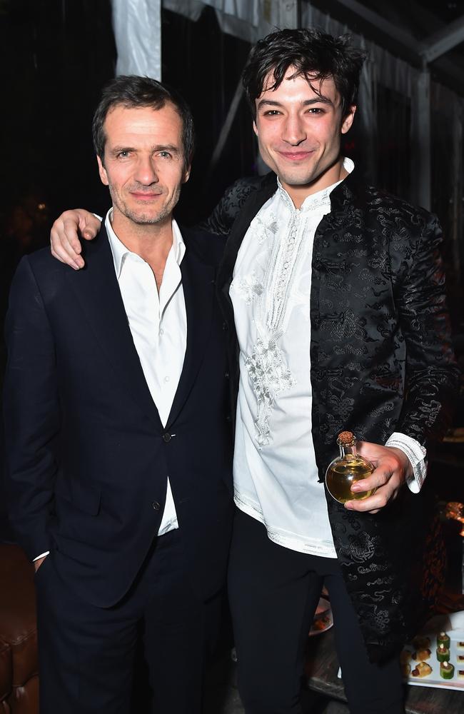 Ezra Miller, right, with producer David Heyman in 2016. Picture: Getty Images