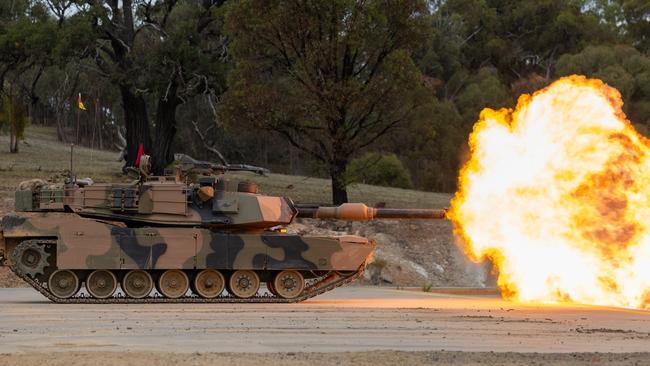 The Australian Army M1A1 Abrams Main Battle Tank fires its 120mm cannon during a live-fire serial for the Coral Balmoral Cup 2024 at the Puckapunyal Military Area, Victoria. *** Local Caption *** From 15 to 19 April 2024, the Royal Australian Armoured Corps hosted the Coral-Balmoral Cup 2024 at the Puckapunyal Military Area, Victoria.  Coordinated by the School of Armour, the competition tested tank and cavalry crews from the Australian Army and United States Marine Corps.  It consisted of a variety of challenges to find the best team from each armoured crew and the best unit in the competition. The competition pays homage to the historic Battle of Coral-Balmoral, which highlighted the effectiveness of combined arms tactics.