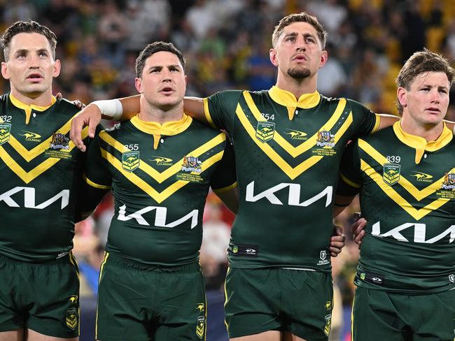 BRISBANE, AUSTRALIA - OCTOBER 18: The Australian players embrace during the men's 2024 Pacific Championships match between Australia Kangaroos and Tonga at Suncorp Stadium on October 18, 2024 in Brisbane, Australia. (Photo by Bradley Kanaris/Getty Images)