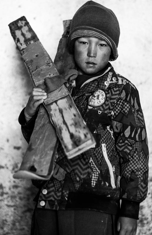 Omid, who doesn't know his age, poses for Australian photographer Andrew Quilty with his homemade skis. Aub Bala, ‘High Water’, is the farthest village up the Fuladi Valley in central Afghanistan’s Bamiyan Province, so named because it is the closest to the source of the valley’s water, which comes off the mountains in snow-melt and rain, deeper in the valley, beyond where the single road reaches. Skiing first came to Aub Bala in 2009, when two staff members of the Aga Khan Foundation visited the village while mapping Bamiyan’s snowfields for the purpose of producing a guide book for skiers. Since then, boys in the village have built their own based on what they remember of the visitors’ equipment. Source: Supplied