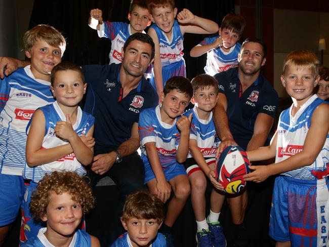 Anthony Minichiello and Michael Gordon with Easts U9s Oztag team who are headed to Coffs Harbour for the State Titles. Picture: Craig Wilson