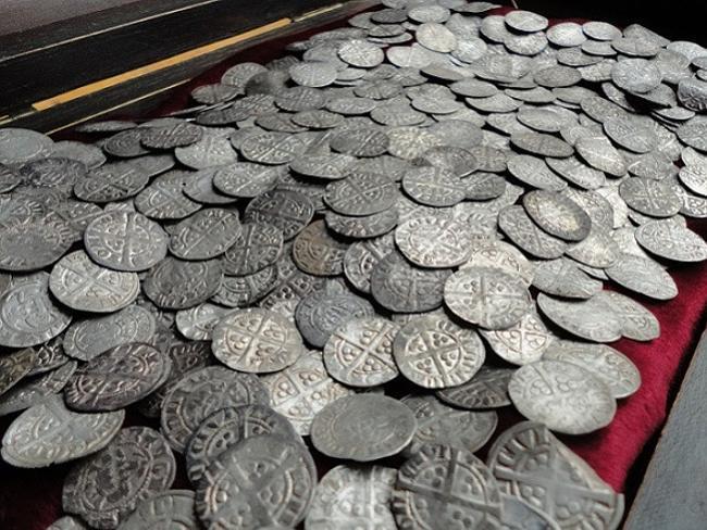 Silver stash ... 322 medieval coins found in rural Scotland were put on display by Scotland’s Treasure Trove Unit.