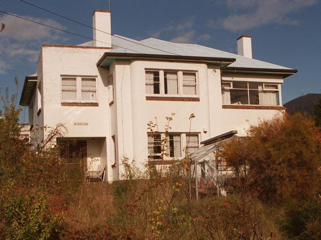 The back of Miss Harvey’s two-storey home in Hobart where Bryant lived in squalor before he carried out the massacre.