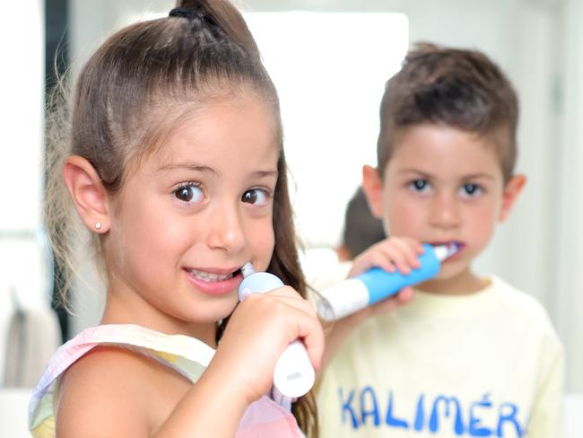 Mary 5yrs and Christian 3yrs Kalligeros, at home brushing their teeth for our fluoride yarn, Mount Gravatt East - on Thursday 16th January 2025 - Photo Steve Pohlner