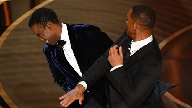 Will Smith (R) slaps Chris Rock onstage during the 94th Oscars in 2022. Picture: AFP.