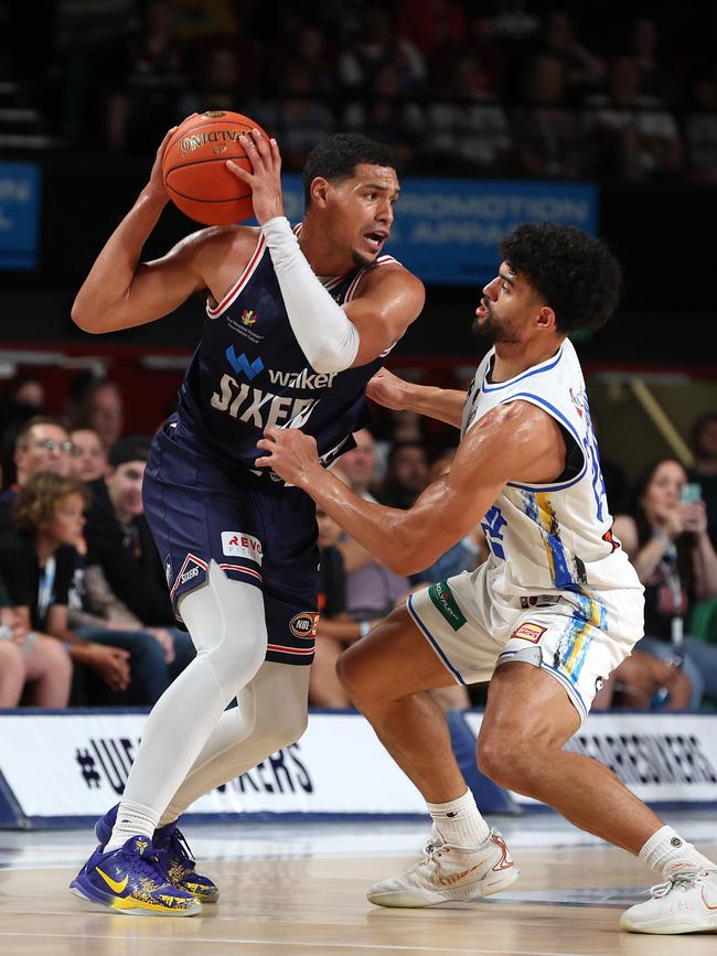 Trey Kell III of the 36ers and Sam McDaniel of the Brisbane Bullets contest the ball. Picture: Sarah Reed/Getty Images.