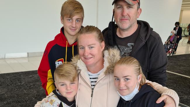 Pauline Markham with husband Gary and children Kaitlyn and Jayden (front) and Tyler at Adelaide Airport before flying to Auckland.