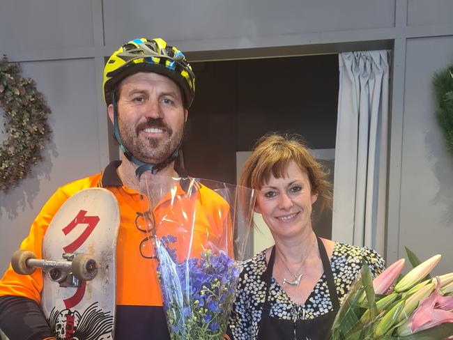 Customer, Tom Martin with owner of the Little Shop of Flowers in Hyde Park, Melanie Leigh. Photo: Lucy Rutherford