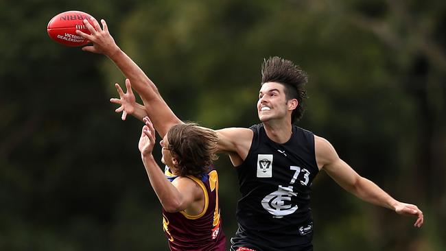 Alex Mirkov of Carlton (R) . (Photo by Graham Denholm/AFL Photos)