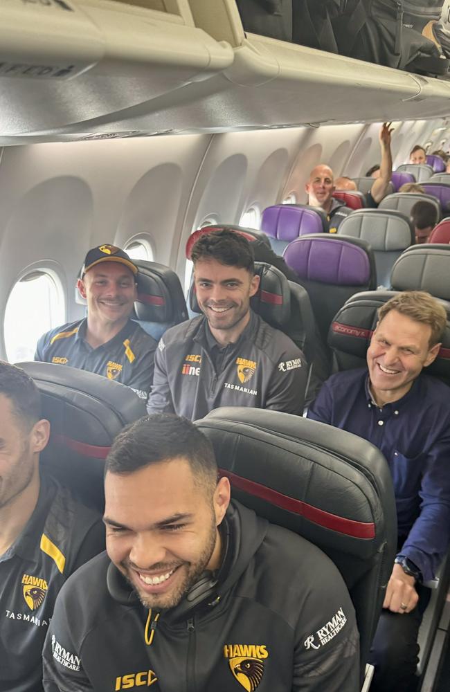 Kane Cornes on the flight to Adelaide with the Hawks.