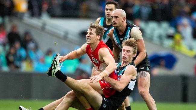 Port Adelaide’s Todd Marshall laying one of his eight tackles on Saturday. Picture: Daniel Kalisz (Getty)