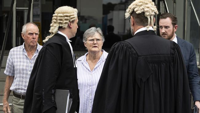 Harris' mother, another family member, and his legal team outside Toowoomba courthouse after a jury found him guilty of stabbing his neighbour Peter Weaver to death, before dismembering and setting the body on fire.