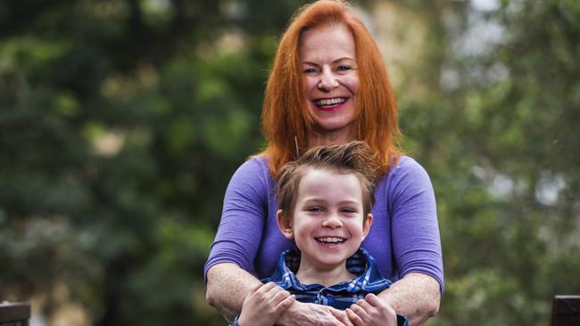 Ollie, pictured with his mum Jo O’Reilly, lost his dad, guitarist Chris Bailey to cancer, before being diagnosed with brain cancer himself. Picture: Jenny Evans