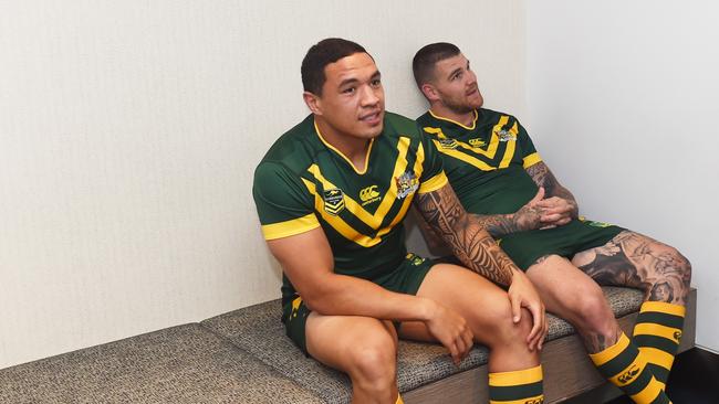 Members of the Kangaroos Four Nations Squad, Tyson Frizell, (left), Josh Dugan and Blake Ferguson (right) talk before a team photograph in Sydney on Thursday, Oct. 6, 2016. The 2016 Rugby League Four Nations tournament will be played in England in October and November with the series being contested by Australia, England, New Zealand and Scotland. (AAP Image/Paul Miller) NO ARCHIVING