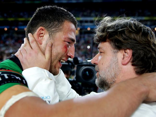 Russell Crowe, pictured with Sam Burgess after the grand final win last year, is fighting to keep his beloved South Sydney team at ANZ Stadium. Picture Gregg Porteous