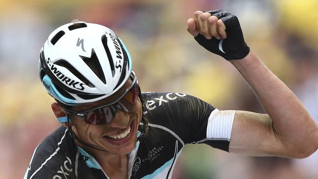 Germany's Tony Martin celebrates as he crosses the finish line to win the fourth stage of the Tour de France cycling race over 223.5 kilometers (138.9 miles) with start in Seraing, Belgium, and finish in Cambrai, France, Tuesday, July 7, 2015. (AP Photo/Peter Dejong)