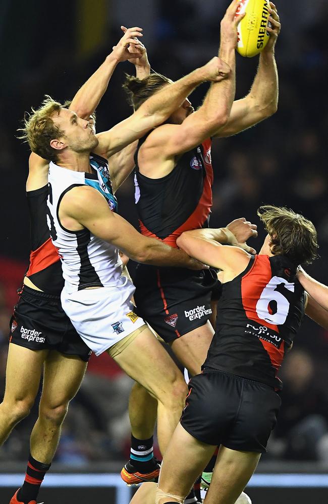 Cale Hooker of the Bombers marks during the Bombers’ hugew win against Port Adelaide.