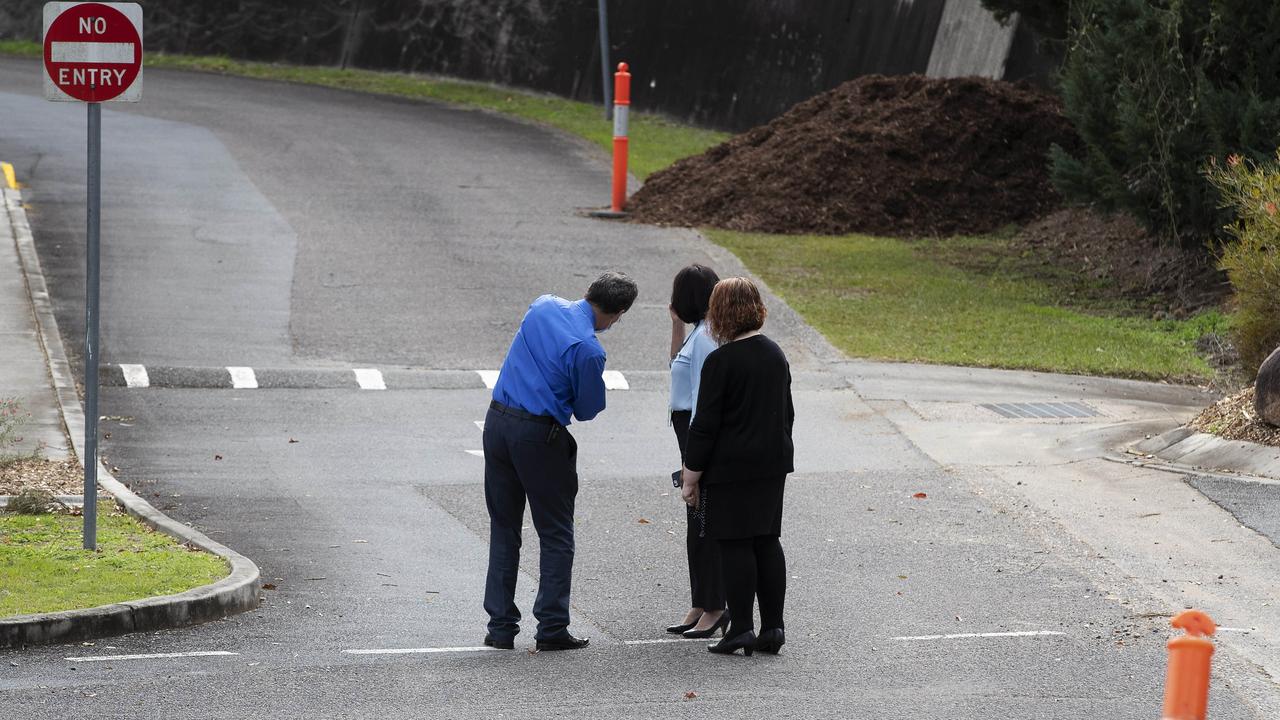 Staff wearing masks at Bolton Clarke Aged Care on Saturday. Picture: Attila Csaszar