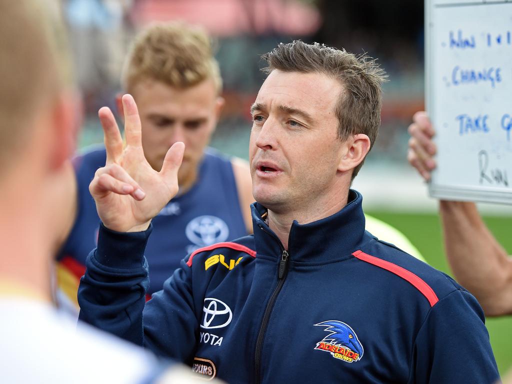 18/09/1 - Adelaide Crows v Sturt. Sanfl Preliminary final at Adelaide Oval.  Adelaide Crows v Sturt.  Crows coach Heath Younie addresses his team at three-quarter time.Photo Tom Huntley