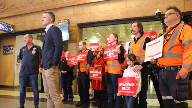 Premier Peter Malinauskas &amp; Transport Minister Tom Koutsantonis, holding a media conference re: trains and trams returning to public hands, with transport union members in attendance at Adelaide Railway Station. 2 April 2023. Picture Dean Martin