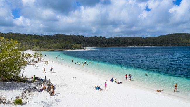 A 2022 sustainability report says key tourist spots at K’gari like Lake McKenzie are already overcrowded a during peak periods.