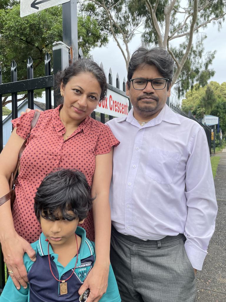 Dundas family Bala Kalb, 40, and his wife Asha Kalb, and son Pranav, 6, outside the bellwether booth of St Bernadette's Primary School in Dundas Valley.