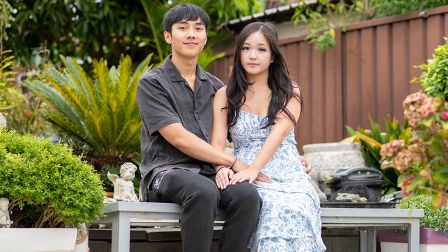 Jayden Nguyen (left) and Katherine Mai (right) were looking forward to watching the famous New Year’s Eve fireworks, having travelled from Liverpool to stay in a ritzy 5-star hotel for the night. Picture: Thomas Lisson