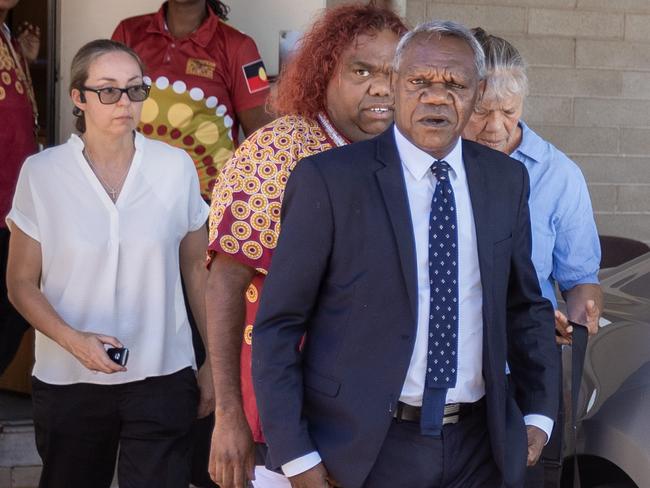 13-08-2024 - Wife beater and chair of Lhere Artepe Aboriginal Corporation Benedict Stevens (blue suit) leaves a meeting with NT chief minister Eva Finocchiaro on Friday. Picture: Liam Mendes / The Australian