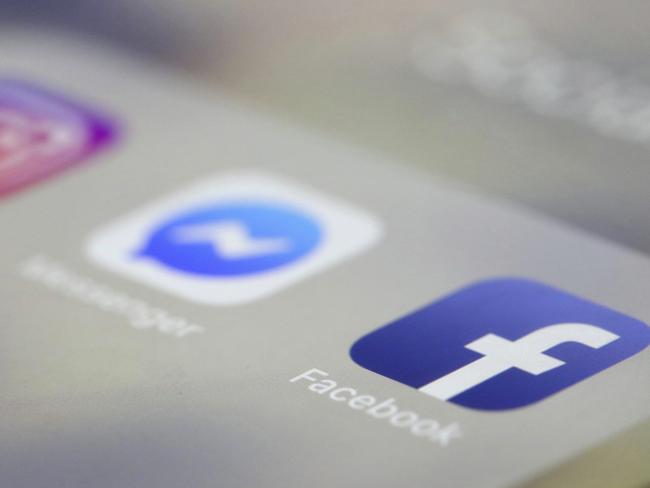 Facebook, Messenger and Instagram apps are are displayed on an iPhone on Wednesday, March 13, 2019, in New York. Facebook says it is aware of outages on its platforms including Facebook, Messenger and Instagram and is working to resolve the issue. (AP Photo/Jenny Kane)