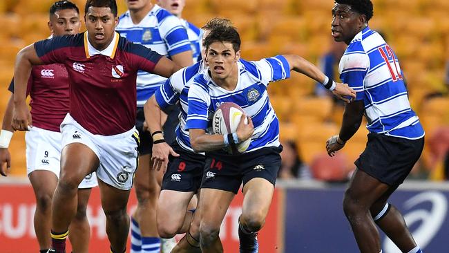 Trezman Banjo of Nudgee College (centre) in action during the St Joseph’s Nudgee College and Brisbane State High School GPS Rugby match at Suncorp Stadium. Picture: AAP Image/Dan Peled