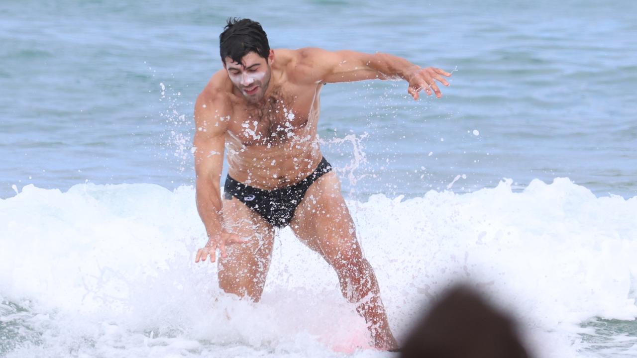 Demons in Lorne: Christian Petracca tries to surf. Picture: Brendan Beckett