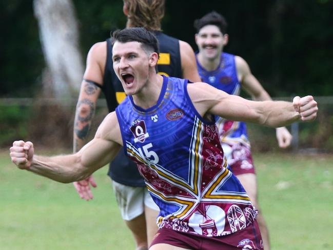 Lions forward Tyron Rainbird celebrates third quarter goal. Cairns City Lions v North Cairns Tigers at Holloways Beach. AFL Cairns 2024. Photo: Gyan-Reece Rocha