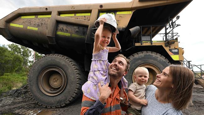 Rehired New Acland mine worker Bodie Sherrington with wife Abby and their children, Isla and Monty, can’t wait for the mine to reopen. Picture: Lyndon Mechielsen